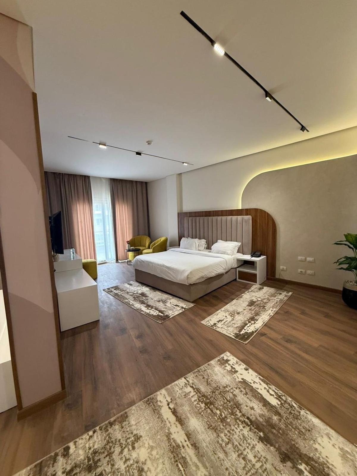 Tolip Family Park Hotel Каир Экстерьер фото A bedroom at the hotel